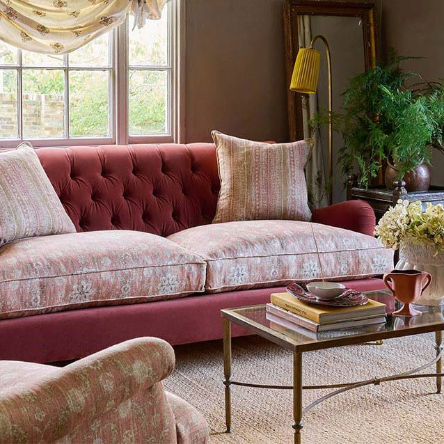 Chiddingfold 3 Seater Sofa in Omega Tawny Velvet and V&A Threads of India Regal Arabesque Flame with scatters in Sulawesi Splendour Jasper